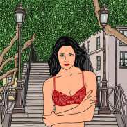 Portrait d'une femme en lingerie rouge sur des escaliers