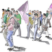 Un groupe de personnes marche dans une rue avec des drapeaux et des banderoles