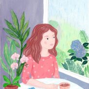 Femme contemplant la pluie à la fenêtre